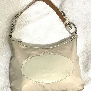 Gorgeous cream colored authentic Prada purse